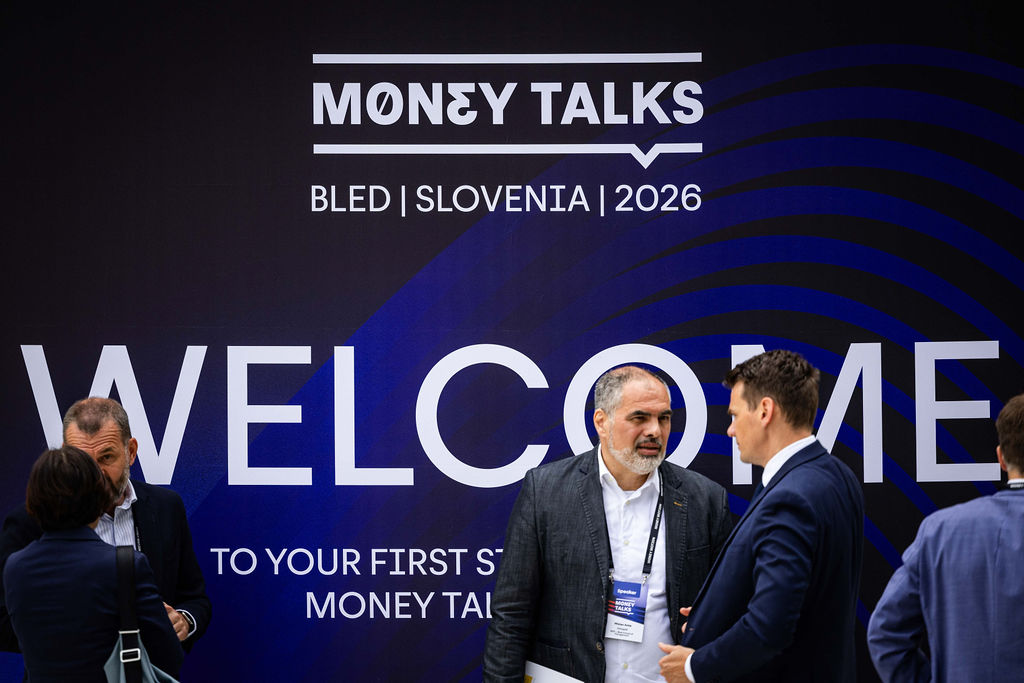 Money Talks Bled welcome wall with attendees